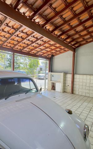 Casa à venda com 113m², 4 quartos e 2 vagas Casa à venda com 113m², 4 quartos e 2 vagasGaragem