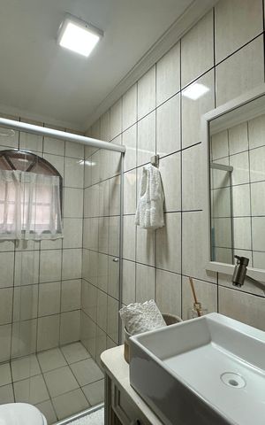 Casa à venda com 120m², 3 quartos e 2 vagas Casa à venda com 120m², 3 quartos e 2 vagasBanheiro 1