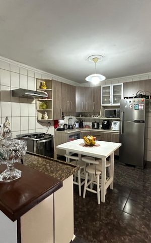 Casa à venda com 120m², 3 quartos e 2 vagas Casa à venda com 120m², 3 quartos e 2 vagasCozinha