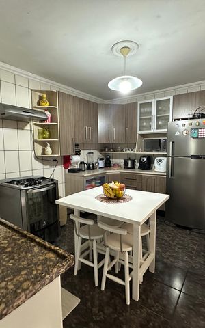 Casa à venda com 120m², 3 quartos e 2 vagas Casa à venda com 120m², 3 quartos e 2 vagasCozinha