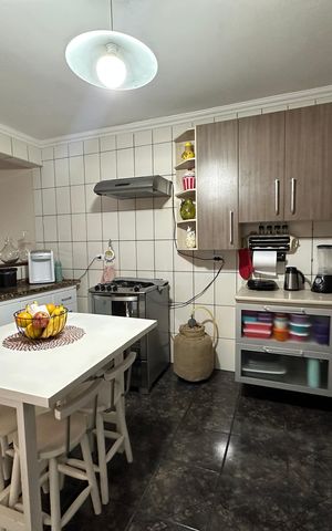 Casa à venda com 120m², 3 quartos e 2 vagas Casa à venda com 120m², 3 quartos e 2 vagasCozinha