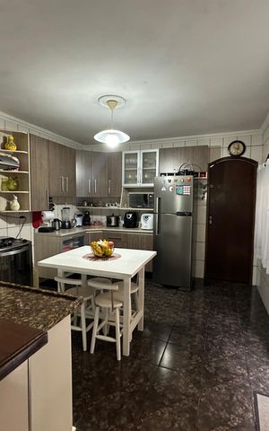 Casa à venda com 120m², 3 quartos e 2 vagas Casa à venda com 120m², 3 quartos e 2 vagasCozinha