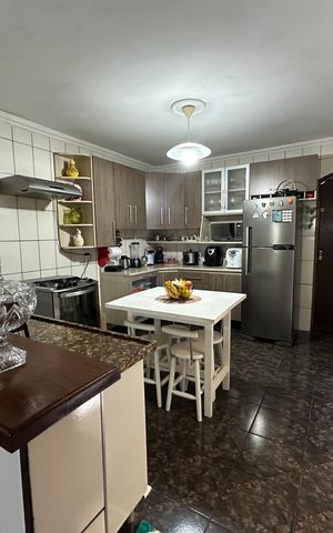 Casa à venda com 120m², 3 quartos e 2 vagas Casa à venda com 120m², 3 quartos e 2 vagasCozinha