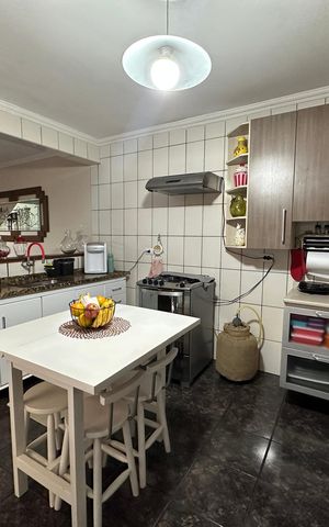 Casa à venda com 120m², 3 quartos e 2 vagas Casa à venda com 120m², 3 quartos e 2 vagasCozinha