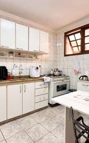 Casa à venda com 87m², 3 quartos e 2 vagas Casa à venda com 87m², 3 quartos e 2 vagasCozinha