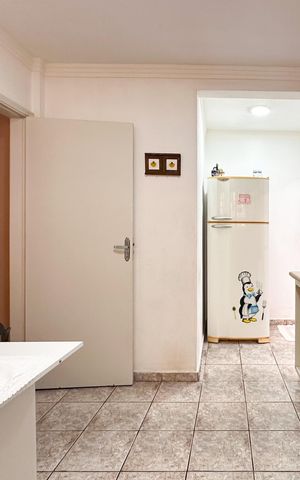 Casa à venda com 87m², 3 quartos e 2 vagas Casa à venda com 87m², 3 quartos e 2 vagasCozinha