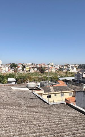 Casa à venda com 110m², 2 quartos e 2 vagas Casa à venda com 110m², 2 quartos e 2 vagasVista do Quintal