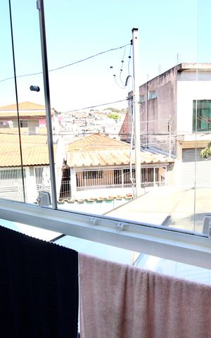 Casa à venda com 68m², 2 quartos e 2 vagas Casa à venda com 68m², 2 quartos e 2 vagasVista da Sacada