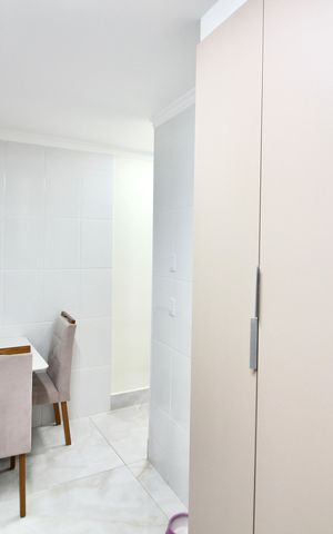 Casa à venda com 68m², 2 quartos e 2 vagas Casa à venda com 68m², 2 quartos e 2 vagasCozinha