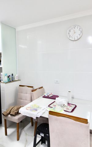 Casa à venda com 68m², 2 quartos e 2 vagas Casa à venda com 68m², 2 quartos e 2 vagasCozinha