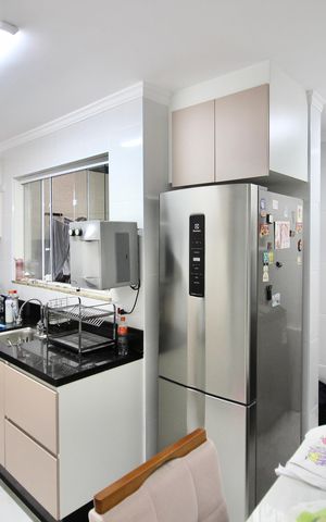 Casa à venda com 68m², 2 quartos e 2 vagas Casa à venda com 68m², 2 quartos e 2 vagasCozinha
