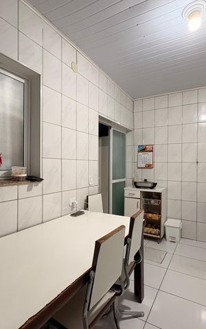 Casa à venda com 160m², 4 quartos e 4 vagas Casa à venda com 160m², 4 quartos e 4 vagasCozinha