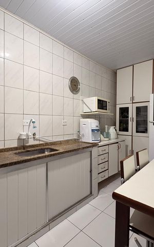 Casa à venda com 160m², 4 quartos e 4 vagas Casa à venda com 160m², 4 quartos e 4 vagasCozinha