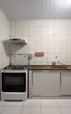 Casa à venda com 160m², 4 quartos e 4 vagas Casa à venda com 160m², 4 quartos e 4 vagasCozinha