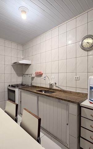 Casa à venda com 160m², 4 quartos e 4 vagas Casa à venda com 160m², 4 quartos e 4 vagasCozinha