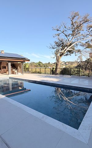 Casa à venda com 128m², 4 quartos e 2 vagasQuintal com piscina e churrasqueira
