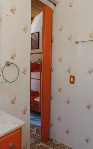 Casa de condomínio para alugar com 84m², 4 quartos e 2 vagasBanheiro da Suíte 1