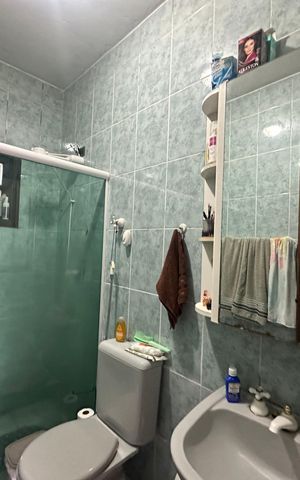 Casa à venda com 210m², 3 quartos e 4 vagas Casa à venda com 210m², 3 quartos e 4 vagasBanheiro da Suíte