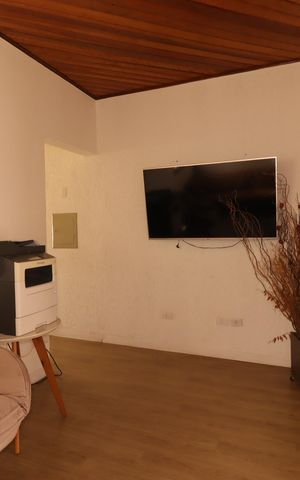 Casa à venda com 245m², 3 quartos e 2 vagasSala de TV