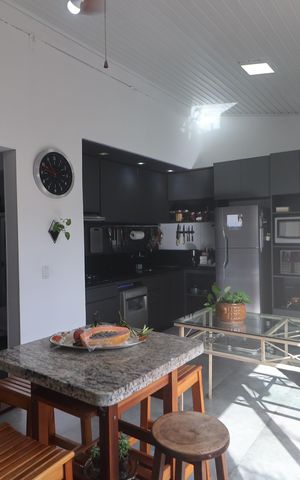 Casa de condomínio à venda com 106m², 3 quartos e 2 vagasCozinha e Área de Serviço