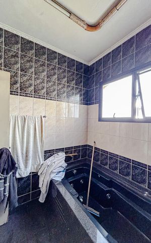 Casa à venda com 275m², 3 quartos e 2 vagasBanheiro da Suíte