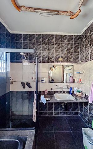Casa à venda com 275m², 3 quartos e 2 vagasBanheiro da Suíte