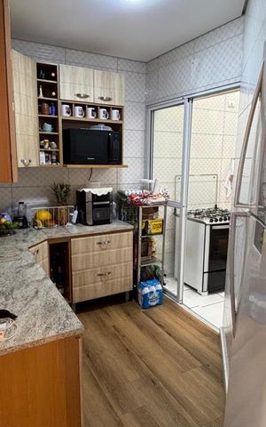 Casa à venda com 70m², 2 quartos e 2 vagas Casa à venda com 70m², 2 quartos e 2 vagasCozinha