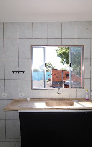 Casa para alugar com 60m², 2 quartos e sem vagaCozinha e Área de Serviço