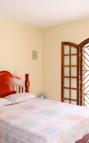Casa à venda com 234m², 5 quartos e 2 vagasQuarto 1