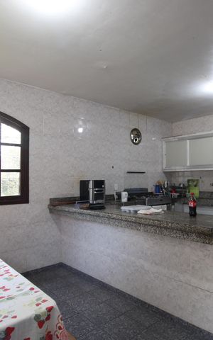 Casa à venda com 140m², 3 quartos e 4 vagasCozinha externa 