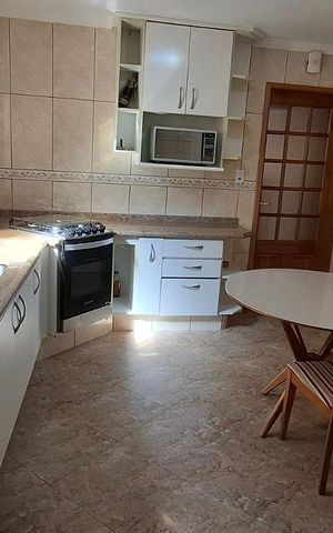 Casa à venda com 200m², 3 quartos e 2 vagas Casa à venda com 200m², 3 quartos e 2 vagasCozinha