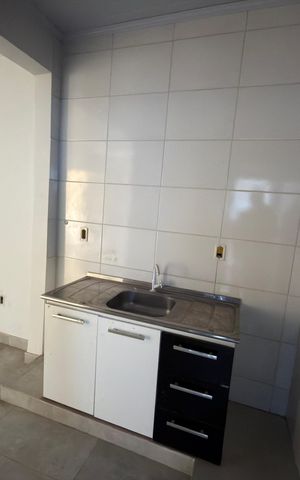Casa à venda com 50m², 3 quartos e 1 vaga Casa à venda com 50m², 3 quartos e 1 vagaCozinha