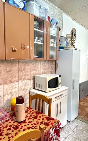 Casa à venda com 440m², 7 quartos e 4 vagas Casa à venda com 440m², 7 quartos e 4 vagasCozinha Casa 1