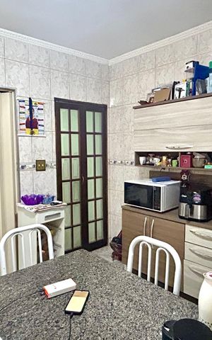 Casa à venda com 440m², 7 quartos e 4 vagas Casa à venda com 440m², 7 quartos e 4 vagasCozinha casa 4