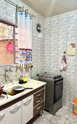 Casa à venda com 440m², 7 quartos e 4 vagas Casa à venda com 440m², 7 quartos e 4 vagasCozinha Casa 1
