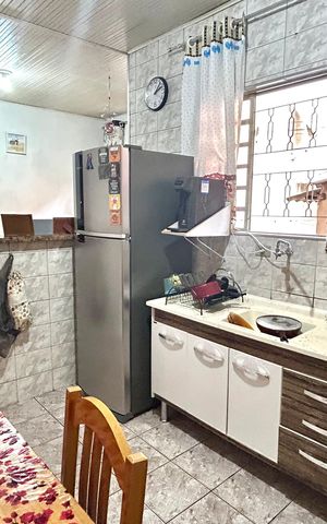 Casa à venda com 440m², 7 quartos e 4 vagas Casa à venda com 440m², 7 quartos e 4 vagasCozinha Casa 1