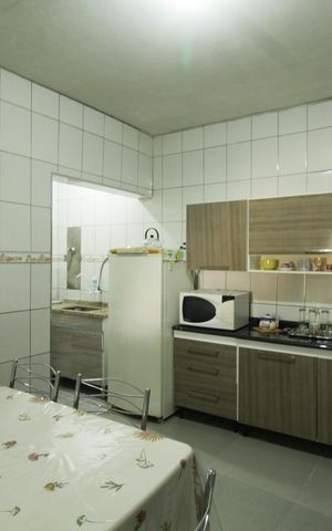 Casa à venda com 50m², 3 quartos e 1 vaga Casa à venda com 50m², 3 quartos e 1 vagaCozinha