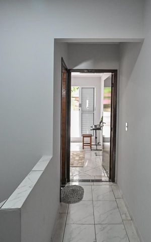 Casa à venda com 74m², 2 quartos e 2 vagasCorredor