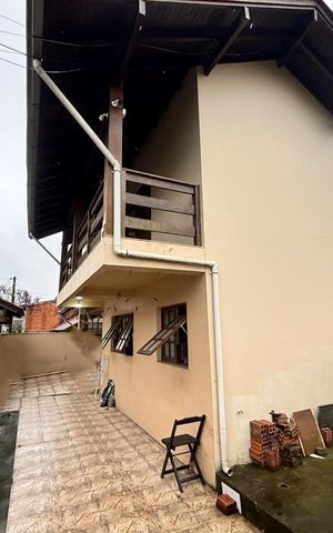 Casa à venda com 257m², 5 quartos e 1 vaga