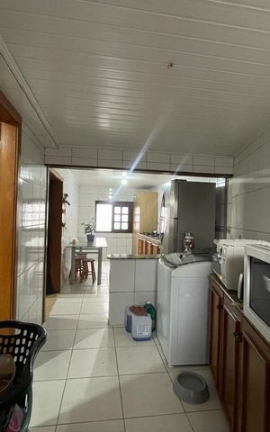 Casa à venda com 257m², 5 quartos e 1 vaga