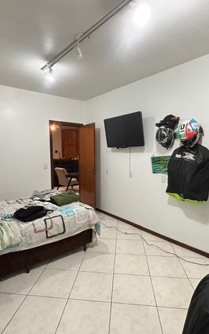 Casa à venda com 257m², 5 quartos e 1 vaga