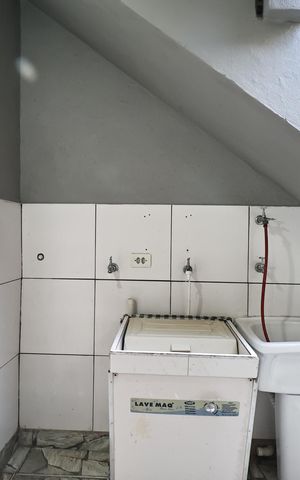 Casa à venda com 133m², 4 quartos e 2 vagasLavanderia