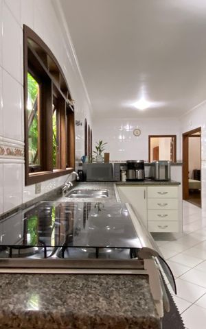Casa à venda com 168m², 3 quartos e 2 vagas Casa à venda com 168m², 3 quartos e 2 vagasCozinha