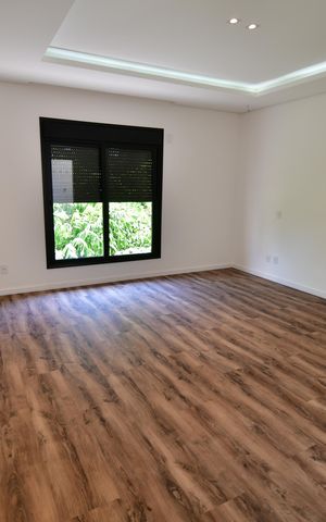 Casa de condomínio para alugar com 310m², 4 quartos e 3 vagasQuarto 4 - Suíte