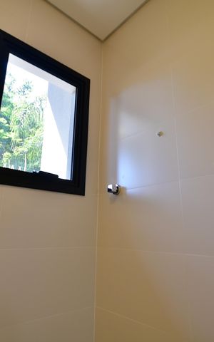 Casa de condomínio para alugar com 310m², 4 quartos e 3 vagasBanheiro Suíte