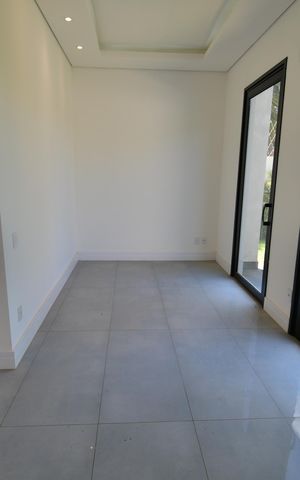 Casa de condomínio para alugar com 310m², 4 quartos e 3 vagasSala