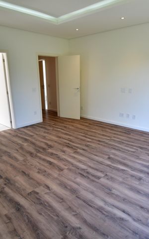 Casa de condomínio para alugar com 310m², 4 quartos e 3 vagasQuarto 4 - Suíte