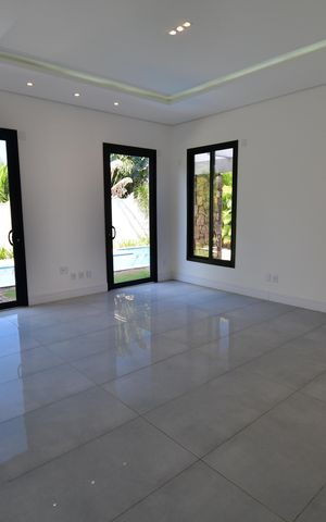 Casa de condomínio para alugar com 310m², 4 quartos e 3 vagasSala