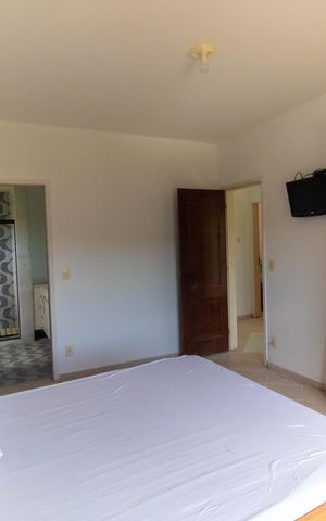 Casa de condomínio à venda com 572m², 4 quartos e 3 vagas Casa de condomínio à venda com 572m², 4 quartos e 3 vagasSuíte