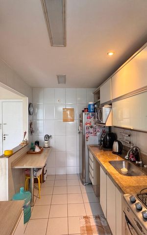 Apartamento à venda com 67m², 2 quartos e 1 vaga Apartamento à venda com 67m², 2 quartos e 1 vagaCozinha e Área de Serviço